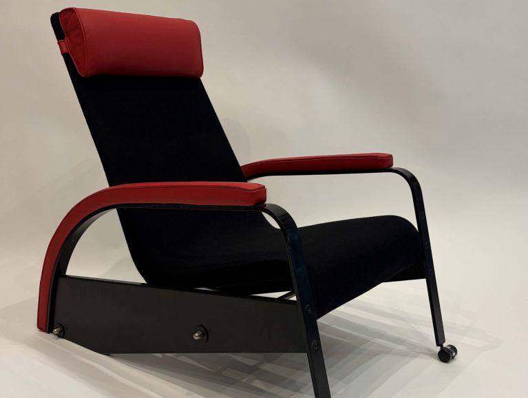 Complete restoration of a "Grand Repos" armchair by designer Jean Prouvé   Fabric by Kvadrat and leather by Tassin.