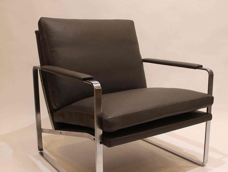 Complete restoration of a conversation chair by designer Preben Fabricius for Knoll, upholstered in Tassin leather