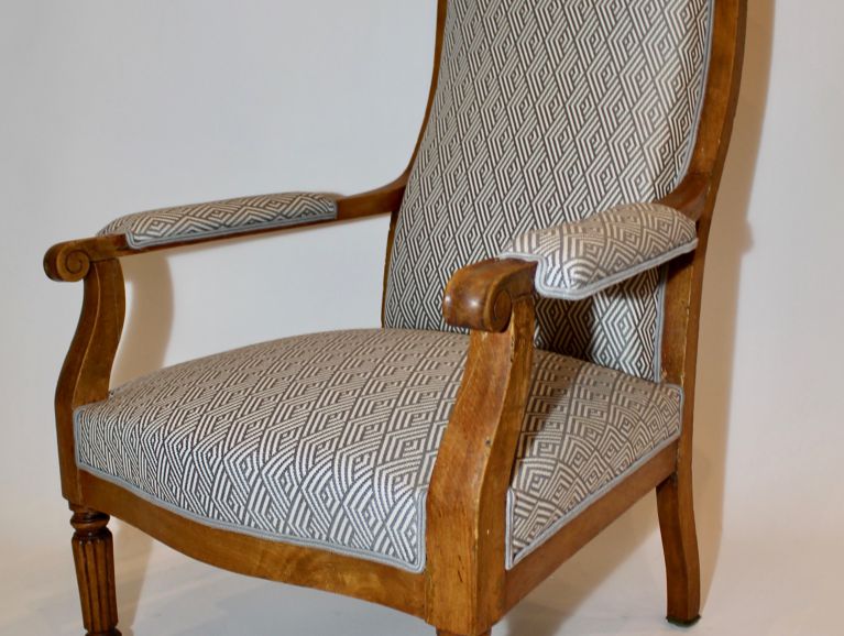 Complete renovation of a Voltaire armchair - Fabric by the Pierre Frey editor with double piping The Passementeries from the Ile de France
